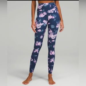 Lululemon high rise leggings in size 8. Buttery soft with tag unattached.